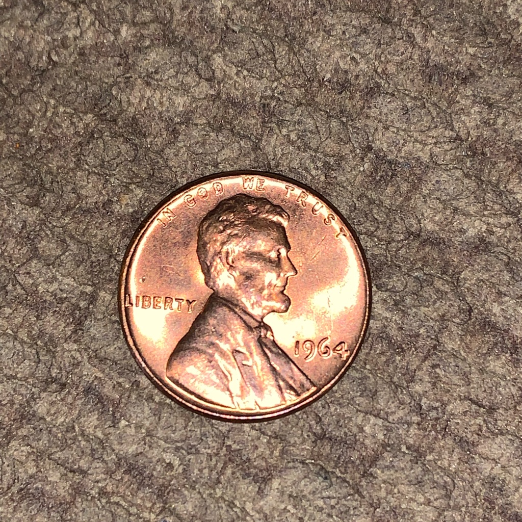 1964 Red Penny In Almost Uncirculated To Uncirculated Condition.